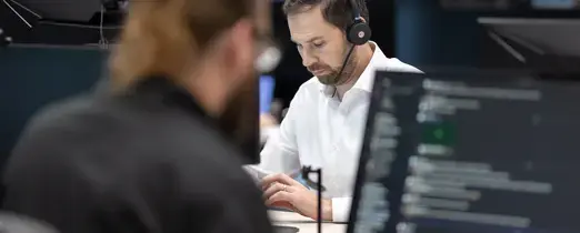 Man working at laptop in office