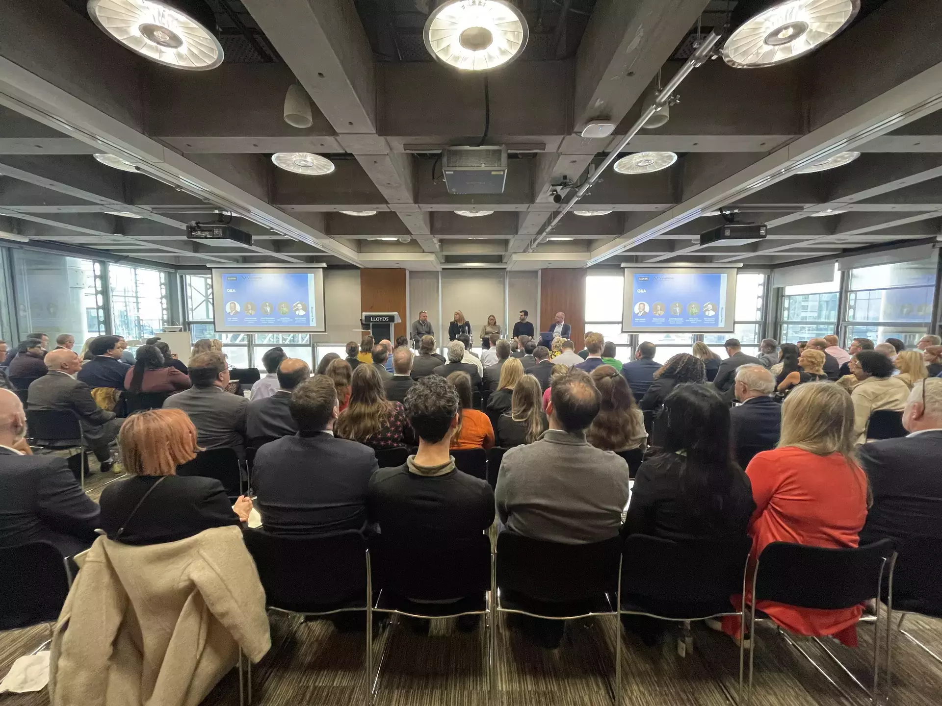 Image of crowd and panelists for the March 2024 Q&A sessions