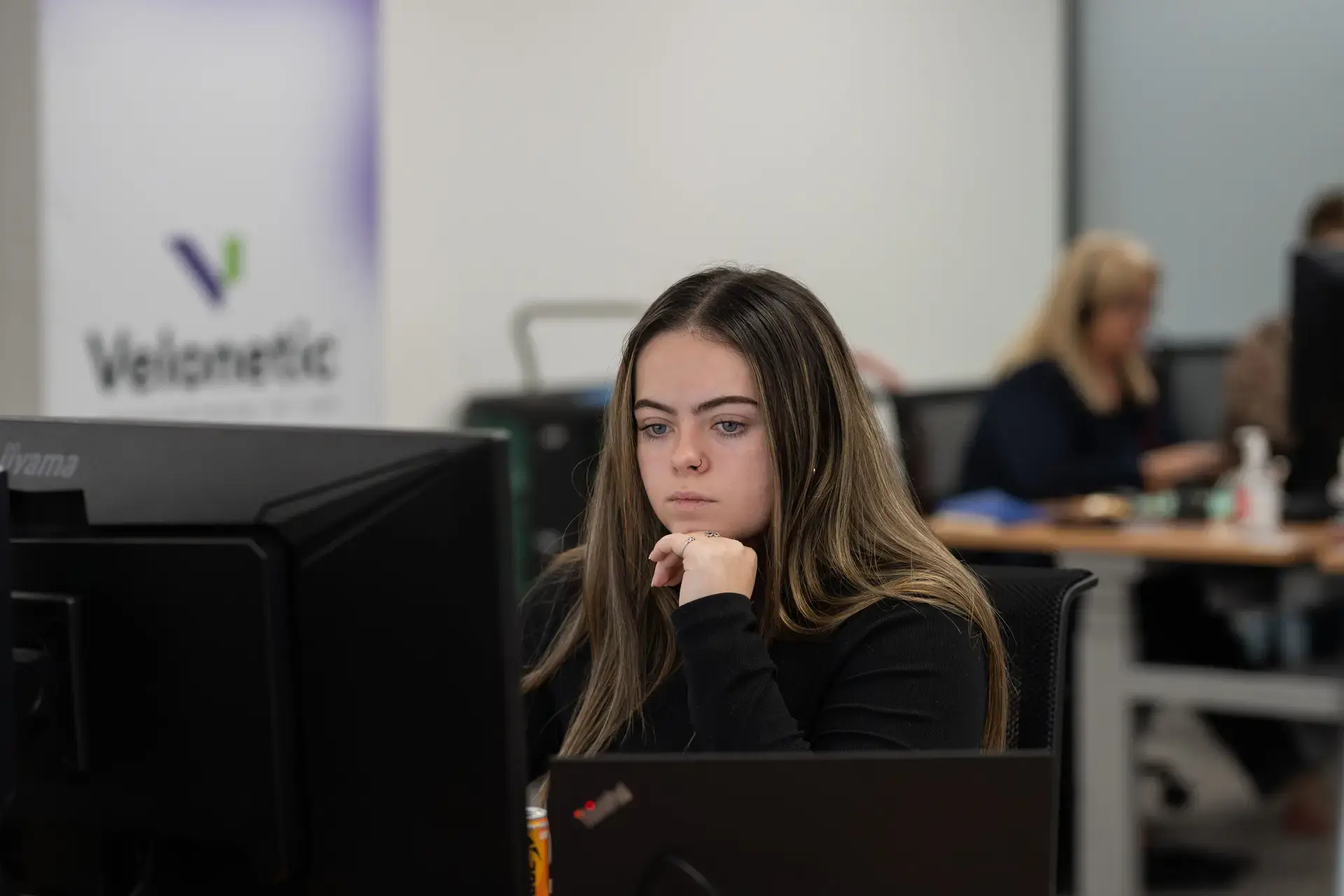 Woman working at desk 
