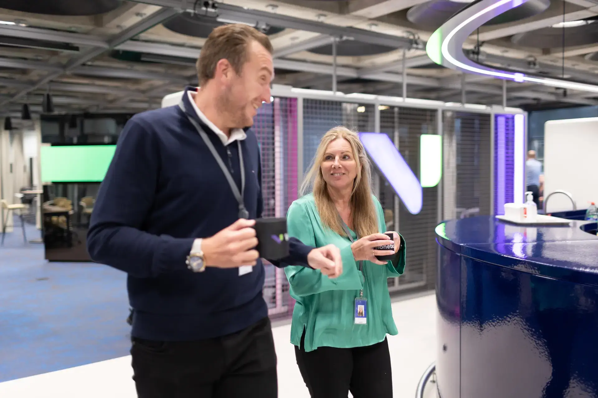 people_colleagues_walking_and_talking_in_office