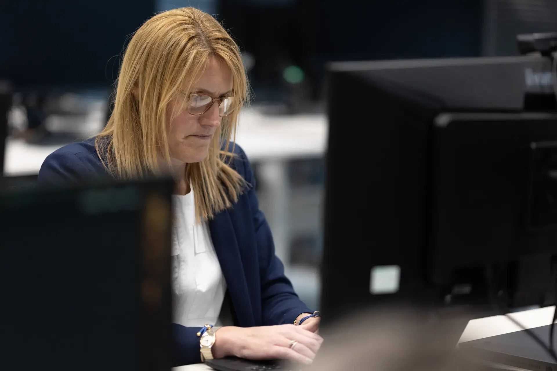 Colleagues working at desk 