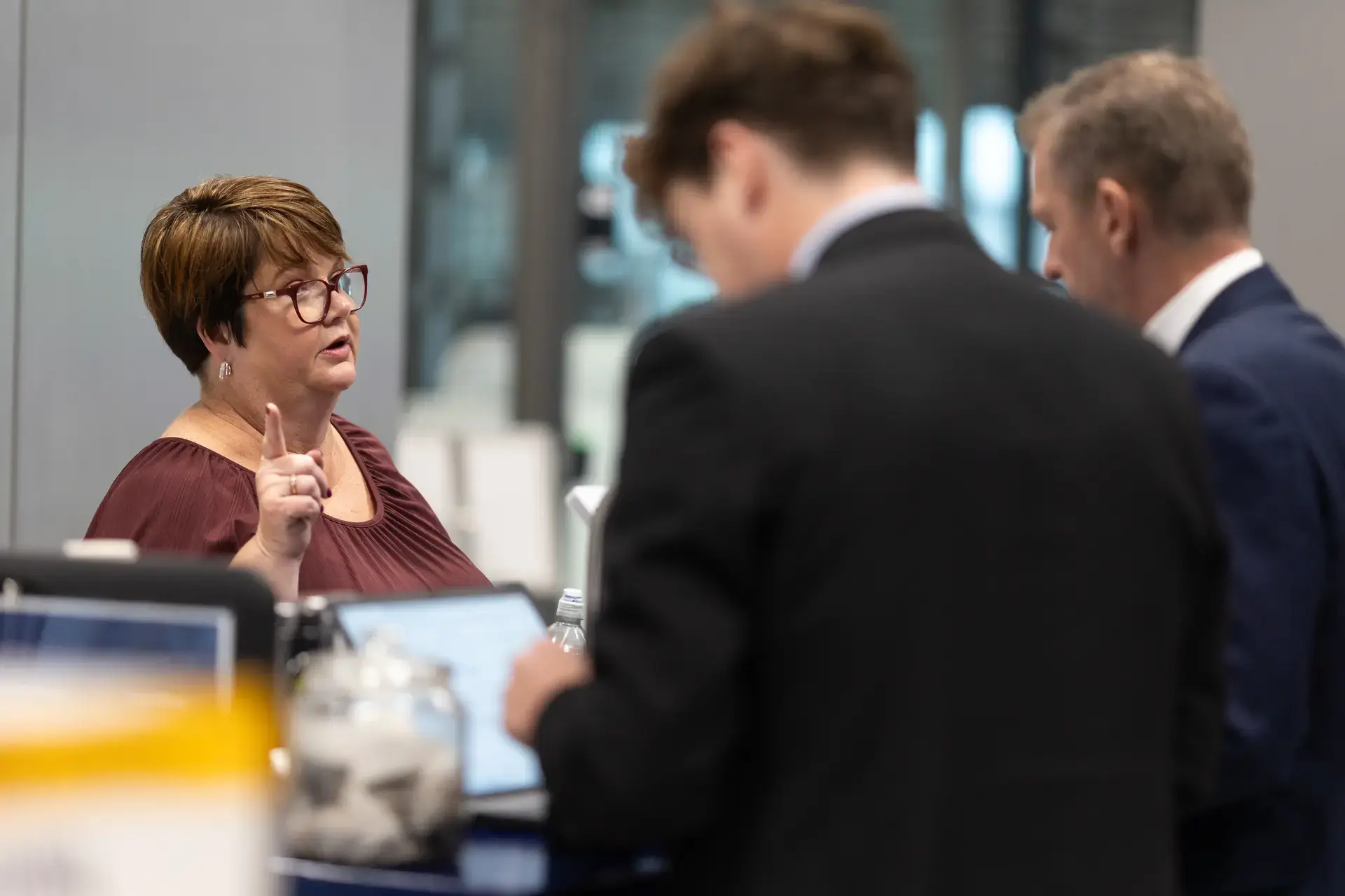 People talking near coffee area 