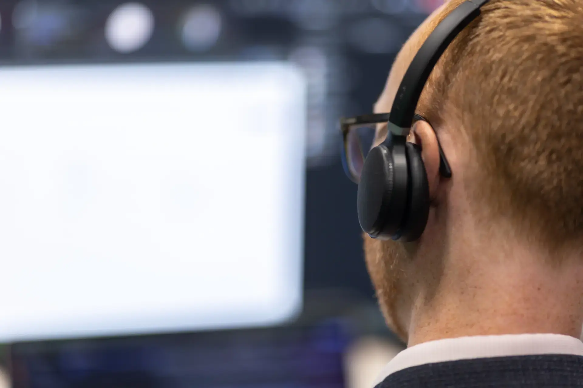 Wearing headphones from behind 